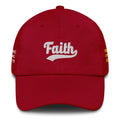 Red cap with 'Faith' embroidered on it 