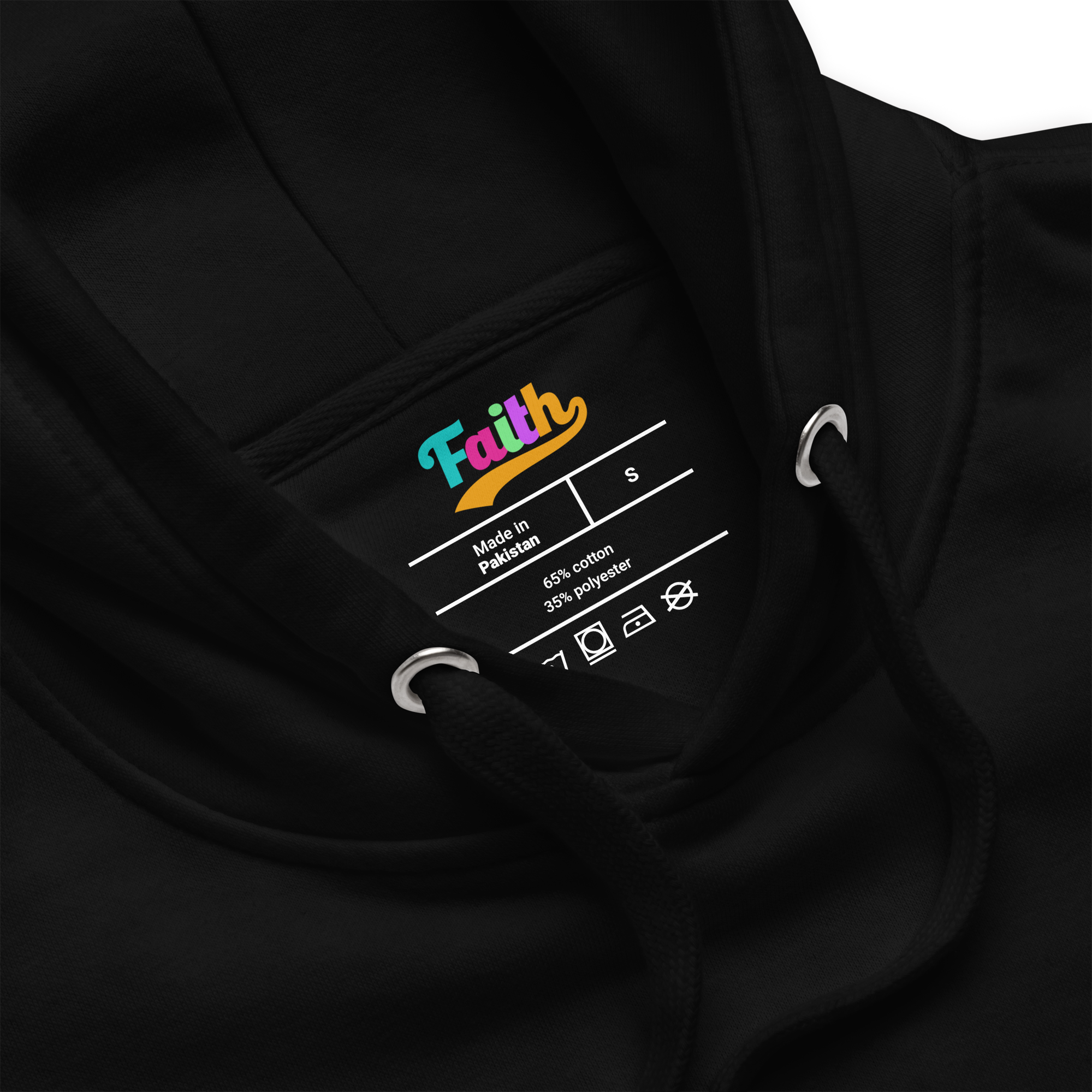 Black hoodie with a label featuring the word 'Faith' on a 